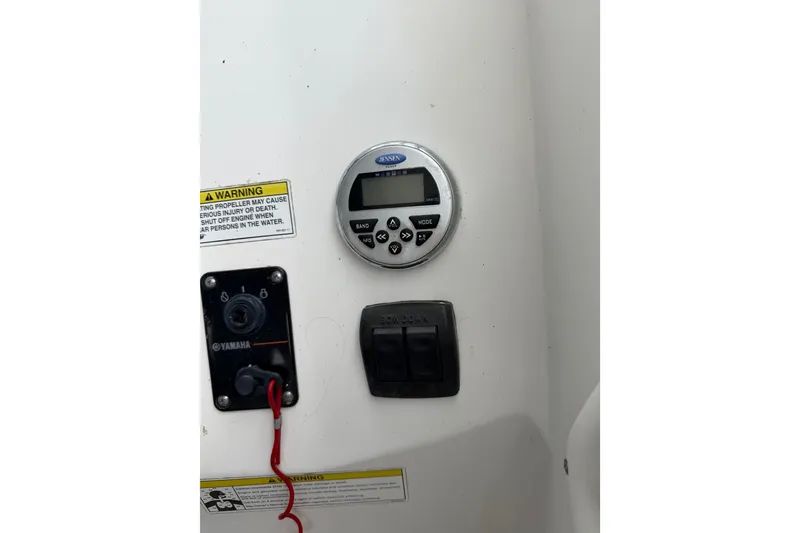 Slide: The Image of Control panel of a 2013 Sea Fox 256 Voyager boat with Yamaha ignition and Jensen display. - 9