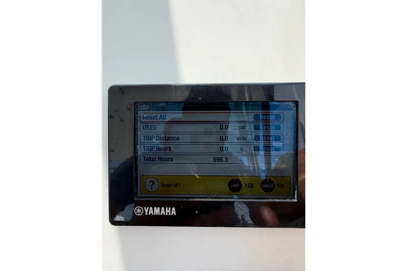 Slide: The Image of Yamaha display on 2013 Sea Fox 256 Voyager showing trip and total hours. - 22