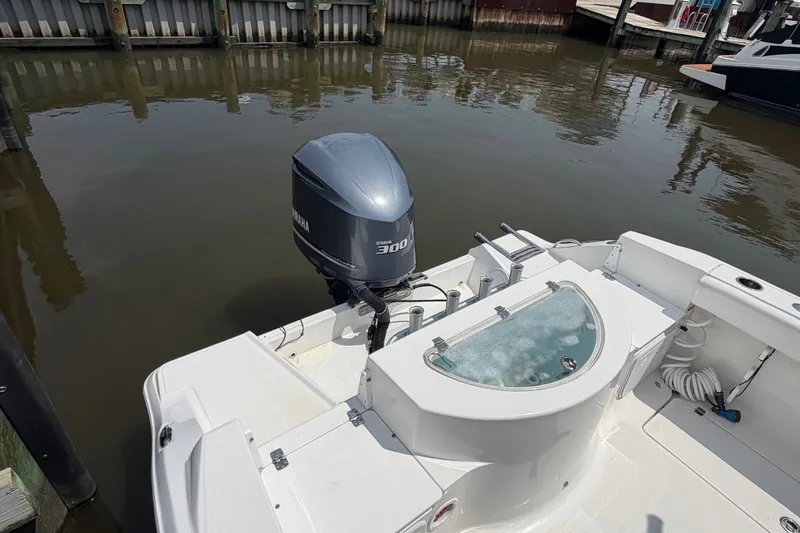 Slide: The Image of 2013 Sea Fox 256 Voyager boat with Yamaha 300 engine at dock. - 13