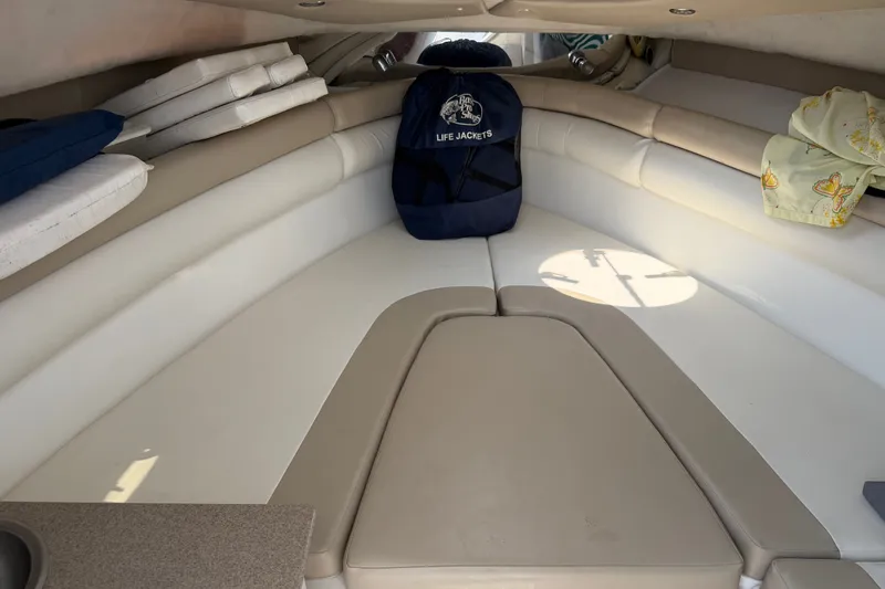 Slide: The Image of 2013 Sea Fox 256 Voyager cabin interior with cushions and life jacket bag. - 32