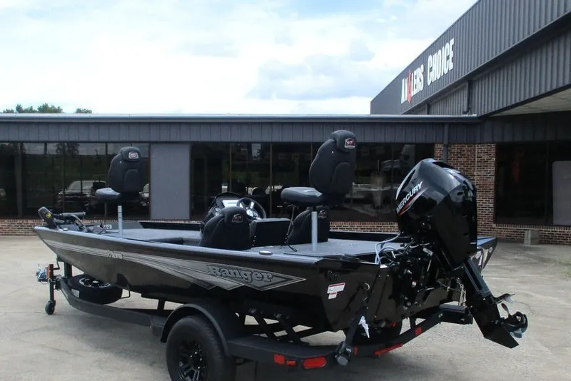 Slide: The Image of 2027 Ranger RT178 boat with Mercury engine parked outside a dealership. - 3