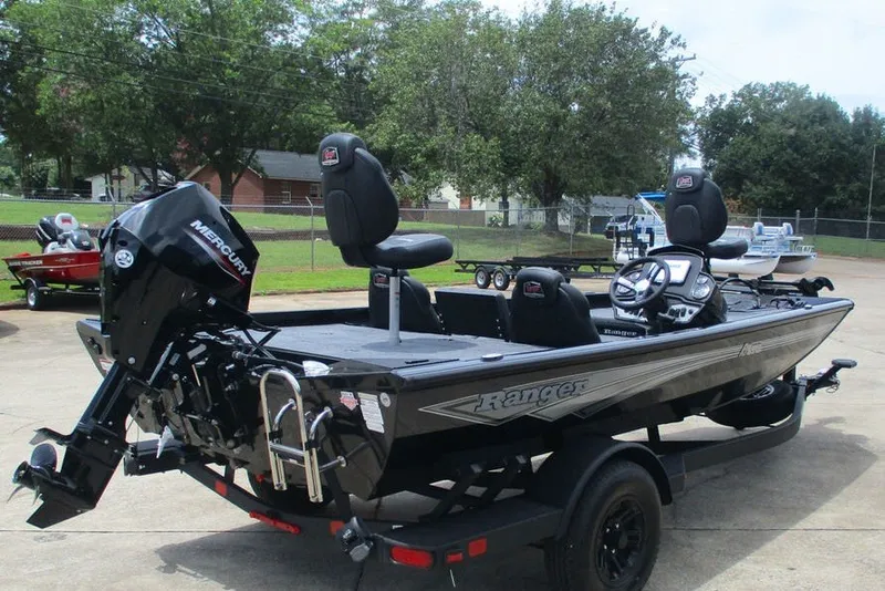 Slide: The Image of 2027 Ranger RT178 fishing boat with Mercury engine on trailer, parked outdoors. - 4