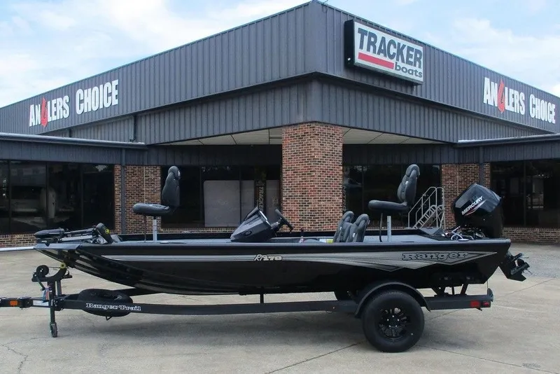 The Image of 2027 Ranger RT178 boat displayed outside Anglers Choice store, featuring sleek design and Mercury engine. - 1