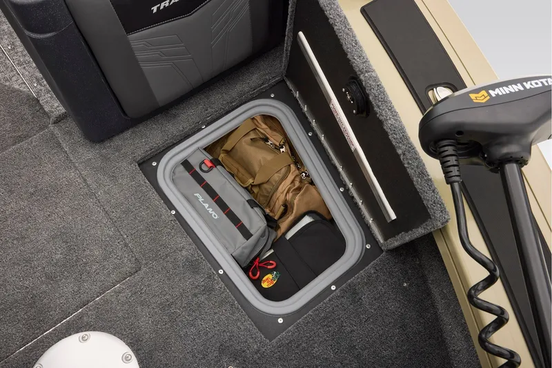 Slide: The Image of Storage compartment in 2027 Tracker Targa V-18 Combo boat with gear and equipment. - 16