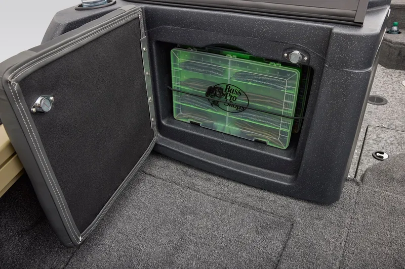 Slide: The Image of 2027 Tracker Targa V-18 Combo storage compartment with Bass Pro Shops tackle box. - 13
