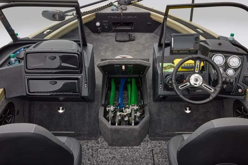 Slide: The Image of 2027 Tracker Targa V-18 Combo boat interior with steering wheel, dashboard, and storage compartments. - 14