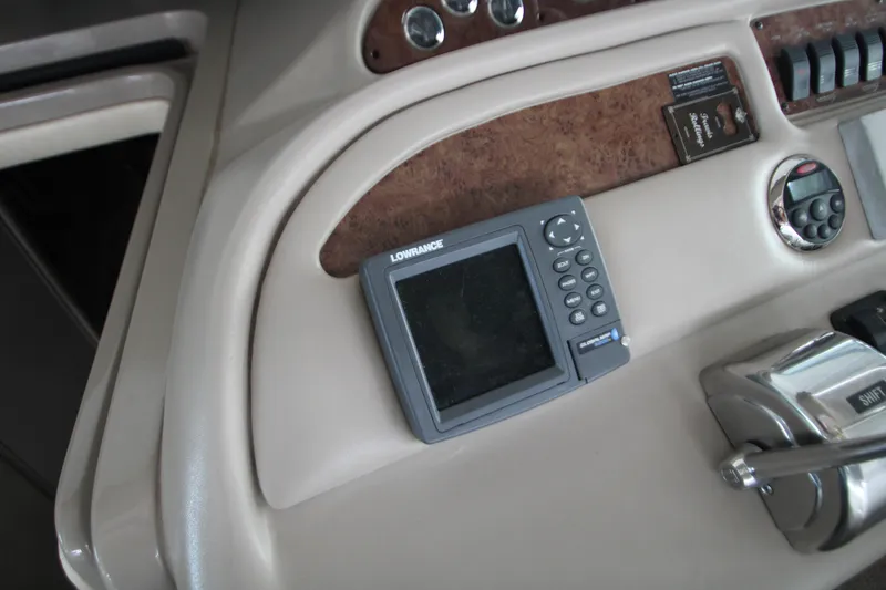 Slide: The Image of Dashboard of 2000 Sea Ray 310 Sundancer with Lowrance navigation system. - 16