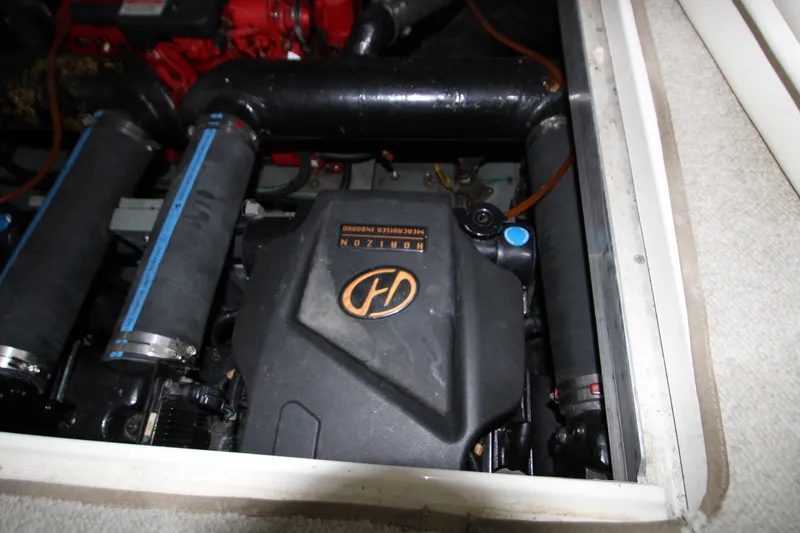 Slide: The Image of Engine compartment of a 2000 Sea Ray 310 Sundancer boat. - 30