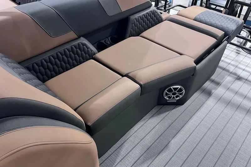 Slide: The Image of Luxurious seating on 2026 Sylvan L3 LZ DH boat with premium upholstery and integrated speaker. - 13