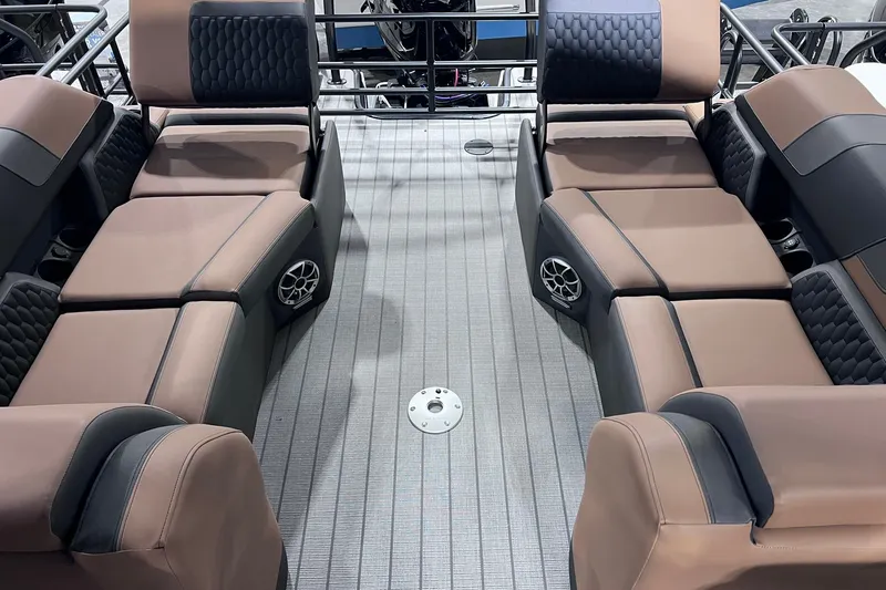 Slide: The Image of Luxurious seating on 2026 Sylvan L3 LZ DH pontoon boat, featuring premium upholstery and speakers. - 7