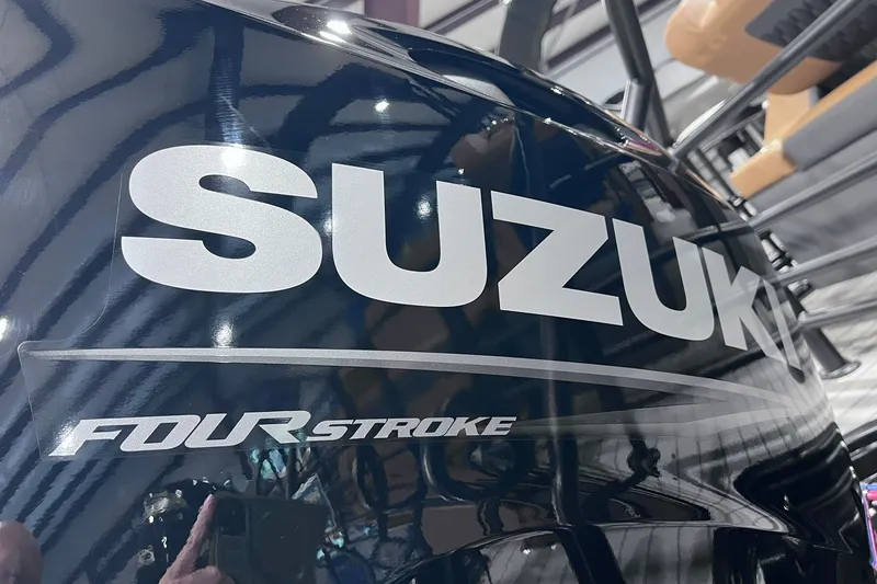 Slide: The Image of Suzuki Four Stroke engine on a 2026 Sylvan L3 LZ DH boat. - 27