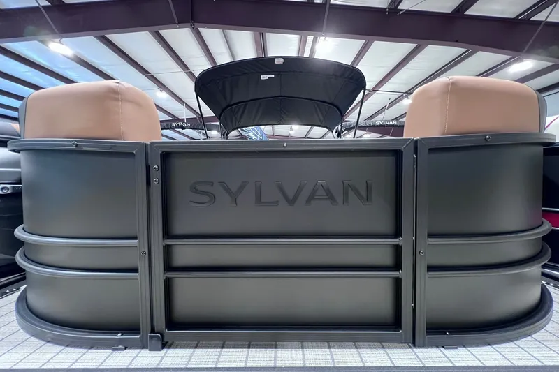 The Image of 2026 Sylvan L3 LZ DH pontoon boat with sleek black design in showroom. - 1