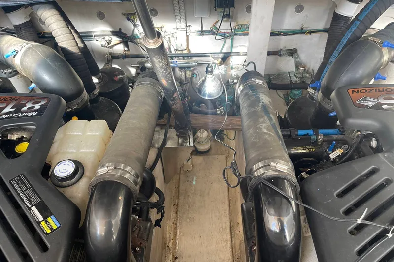 Slide: The Image of Engine room of a 2003 Sea Ray 360 Sundancer with MerCruiser Horizon engines. - 38