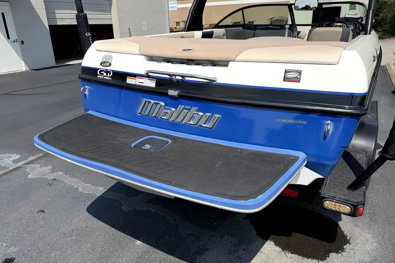 Slide: The Image of Rear view of a 2008 Malibu iRide boat with swim platform. - 8