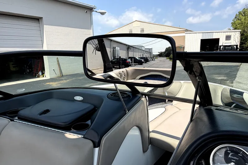 Slide: The Image of 2008 Malibu iRide boat interior with rearview mirror and dashboard view. - 28
