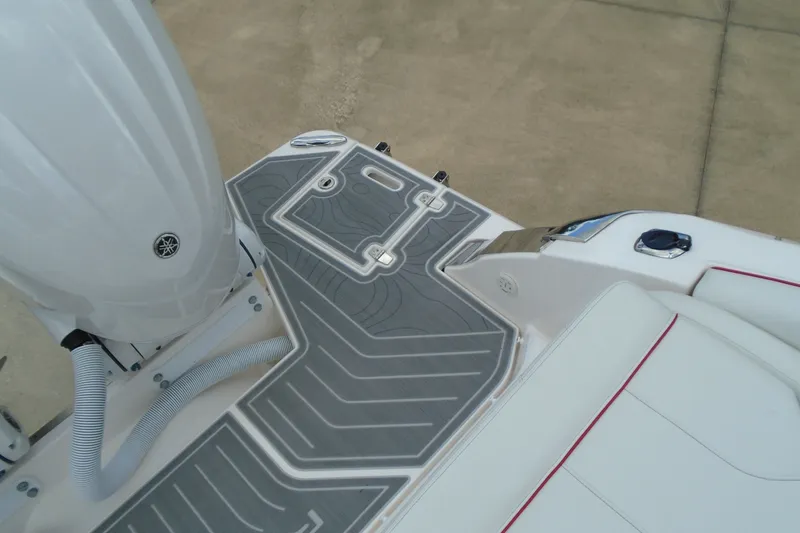 Slide: The Image of 2024 Regal LX9 boat deck with sleek design and modern features. - 26