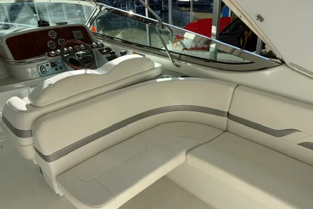 Slide: The Image of 2005 Formula 370 Super Sport boat interior with luxurious seating and modern dashboard. - 36
