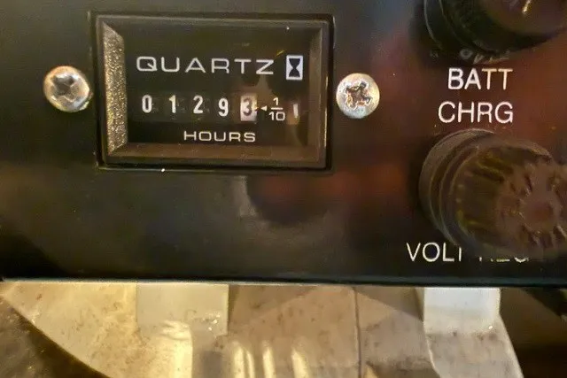 Slide: The Image of Hour meter reading 1293.1 hours on a 2005 Formula 370 Super Sport boat. - 8