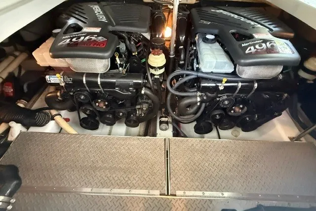 Slide: The Image of Twin Mercury 496 engines in a 2005 Formula 370 Super Sport boat. - 11