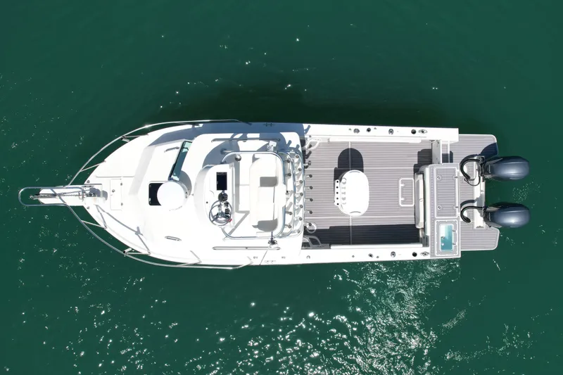 Slide: The Image of Overhead view of 2022 Parker 2520 XLD Sport Cabin boat on water. - 5