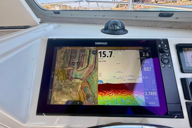 Slide: The Image of Simrad navigation display on 2022 Parker 2520 XLD Sport Cabin boat dashboard. - 42