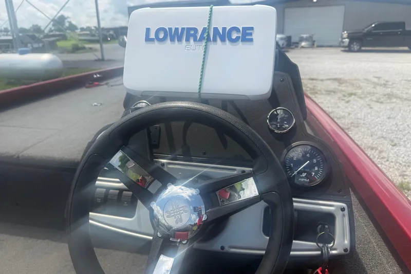 Slide: The Image of 2018 Ranger RT188 boat dashboard with Lowrance Elite fishfinder and steering wheel. - 8