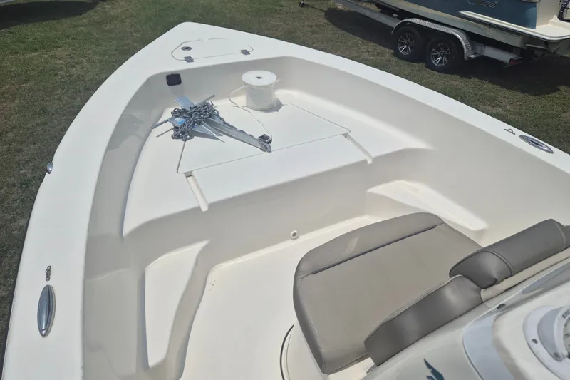 Slide: The Image of 2024 Key West 179 FS boat interior with anchor and seating area. - 15