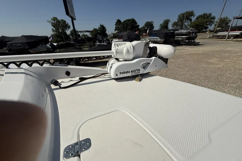 Slide: The Image of 2023 Tahoe 2150 CC boat with Minn Kota Ulterra trolling motor on deck. - 9