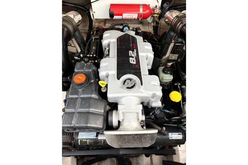 Slide: The Image of Engine of a 2006 Sea Ray 270 SLX boat, featuring a MerCruiser 8.2 MAG engine. - 37