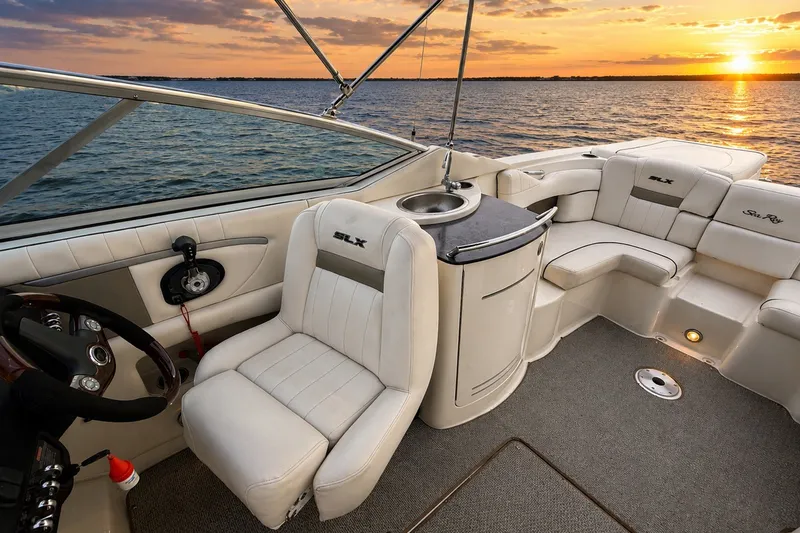 Slide: The Image of Luxurious 2006 Sea Ray 270 SLX boat interior with sunset view over the water. - 28