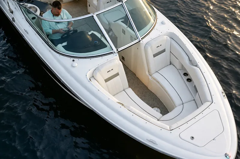 Slide: The Image of 2006 Sea Ray 270 SLX boat on water, featuring spacious seating and sleek design. - 5