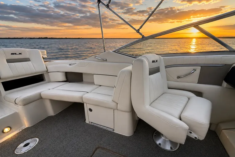 Slide: The Image of Luxury interior of 2006 Sea Ray 270 SLX boat at sunset on the water. - 26