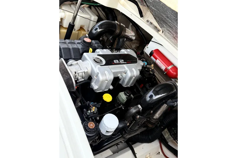 Slide: The Image of Engine compartment of a 2006 Sea Ray 270 SLX boat, featuring a MerCruiser 8.2L engine. - 40