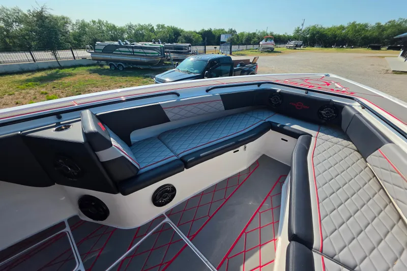 Slide: The Image of 2024 Fountain 38 SC boat interior with luxurious seating and modern design. - 14
