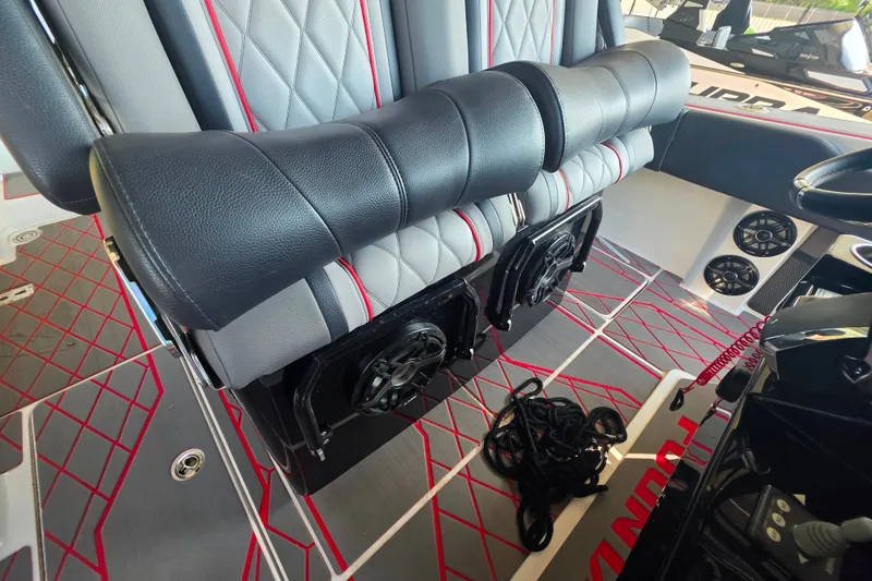 Slide: The Image of 2024 Fountain 38 SC boat interior with luxurious seating and modern design elements. - 16