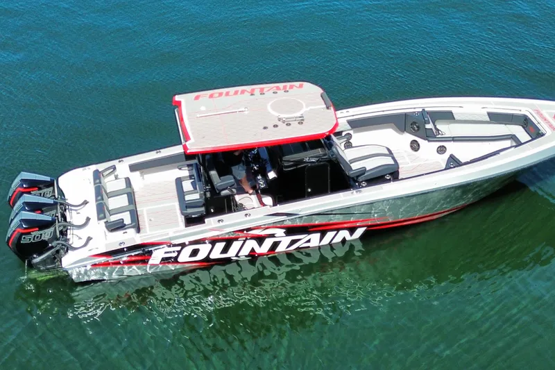Slide: The Image of 2024 Fountain 38 SC boat on water, featuring sleek design and powerful engines. - 5