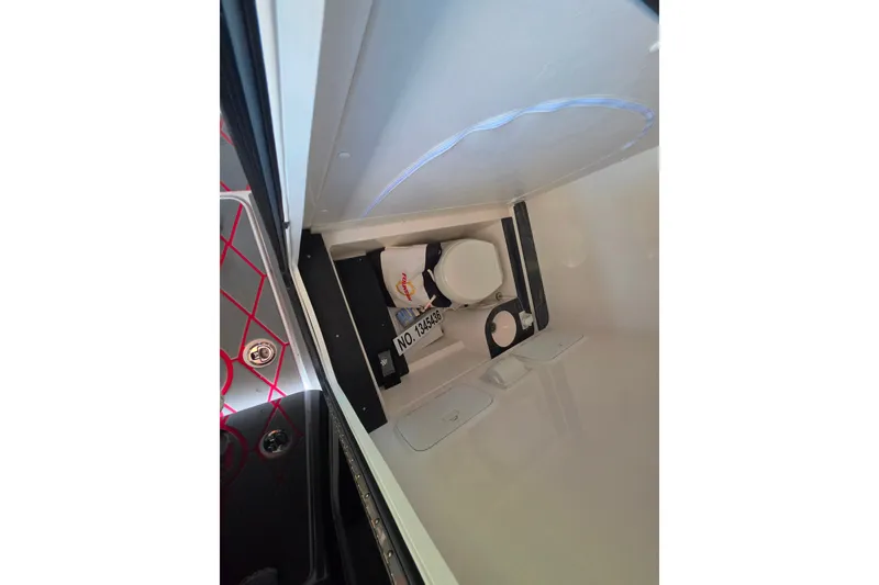 Slide: The Image of Interior view of 2024 Fountain 38 SC boat storage compartment. - 17
