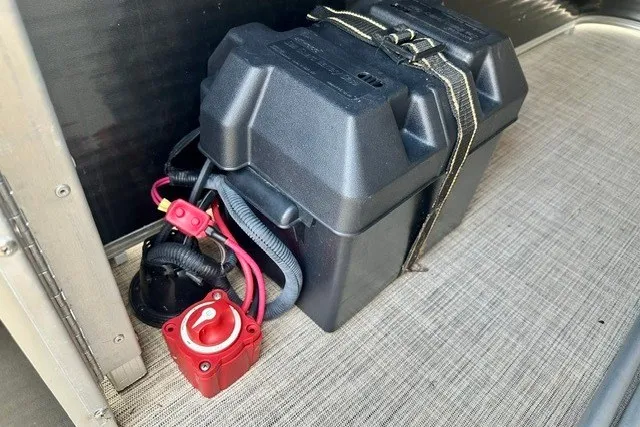 Slide: The Image of Battery compartment of 2017 Landau Island Breeze 212 Cruise pontoon boat with wiring and switch. - 13