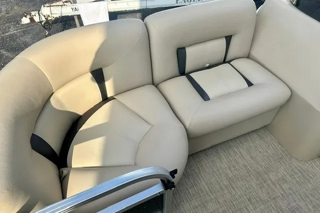Slide: The Image of 2017 Landau Island Breeze 212 Cruise boat seating with beige upholstery and black accents. - 5