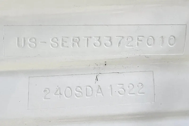 Slide: The Image of Hull identification number on 2010 Sea Ray 240 Sundancer boat. - 57