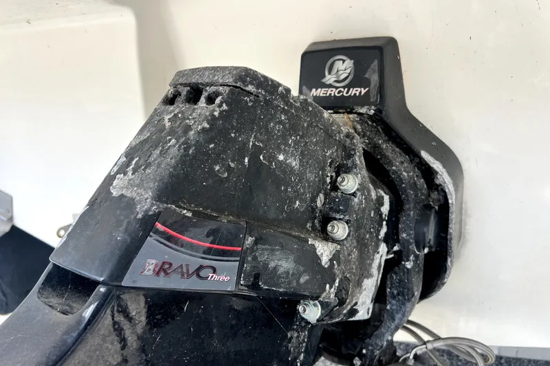 Slide: The Image of Outboard motor of 2010 Sea Ray 240 Sundancer with Mercury Bravo Three drive. - 23