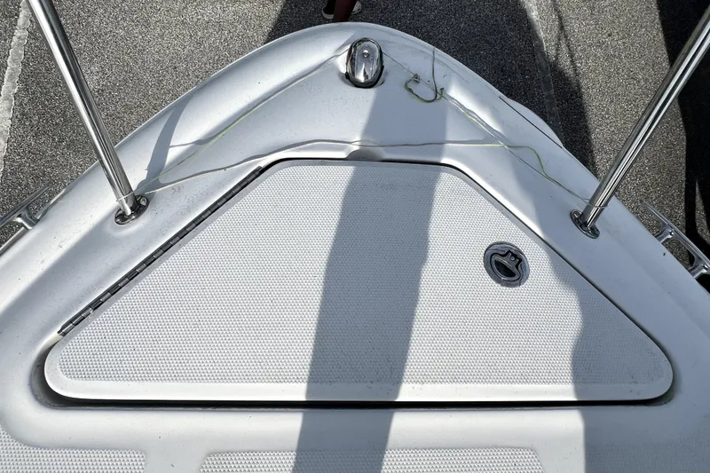 Slide: The Image of Bow of a 2010 Sea Ray 240 Sundancer boat with stainless steel fittings. - 35