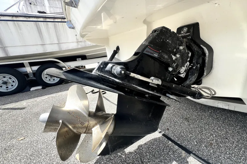 Slide: The Image of Propeller and drive of 2010 Sea Ray 240 Sundancer boat on trailer. - 26