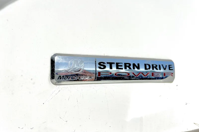 Slide: The Image of Chrome MerCruiser stern drive power badge on 2010 Sea Ray 240 Sundancer boat. - 30