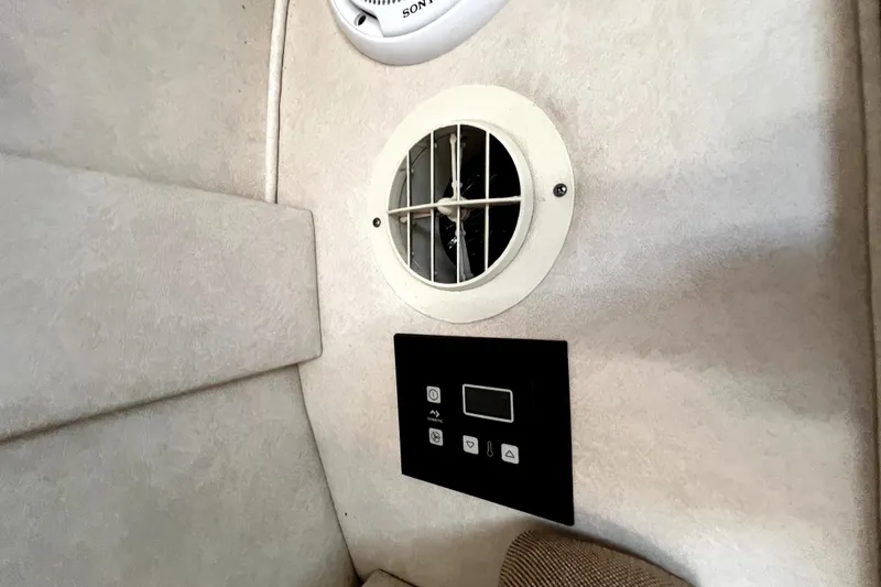 Slide: The Image of Interior of 2010 Sea Ray 240 Sundancer showing vent and control panel. - 67