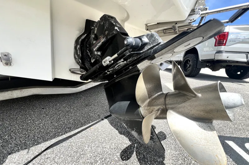Slide: The Image of Close-up of a 2010 Sea Ray 240 Sundancer boat propeller and drive system. - 25