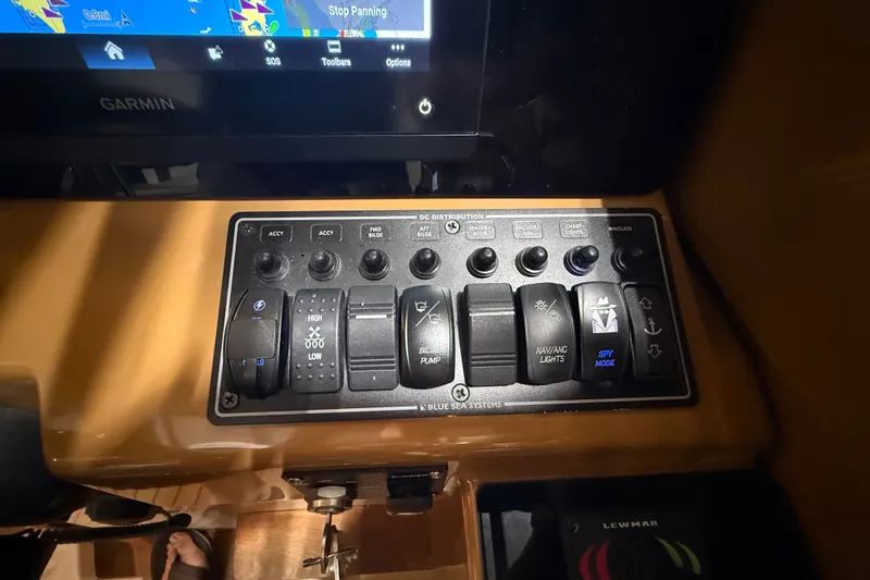 Slide: The Image of Control panel of a 2016 Cutwater C-24 boat with Garmin navigation display. - 38