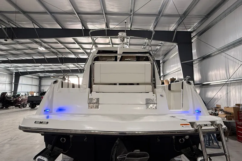 Slide: The Image of 2016 Cutwater C-24 boat in a spacious indoor storage facility. - 3