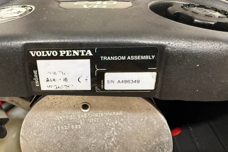 Slide: The Image of Volvo Penta engine label on a 2016 Cutwater C-24 boat, showing transom assembly details. - 44