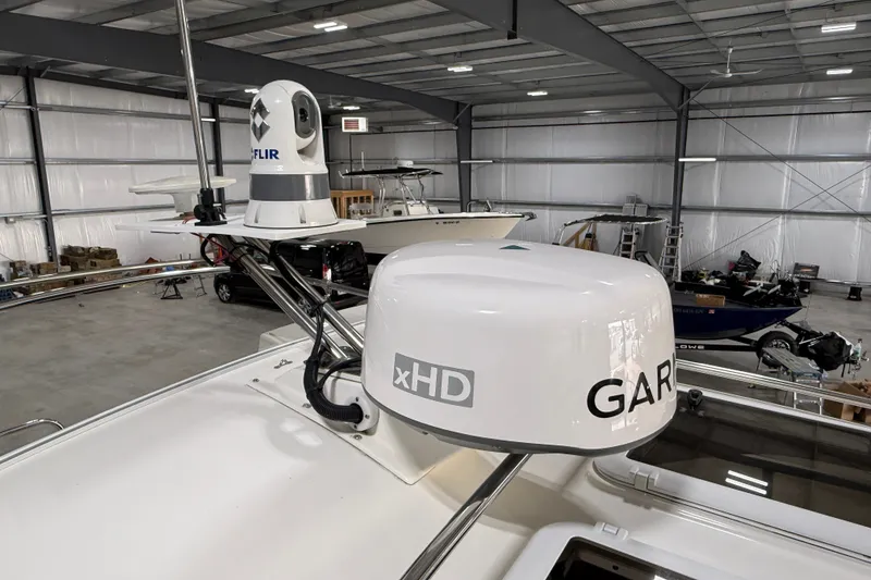 Slide: The Image of 2016 Cutwater C-24 boat with Garmin xHD radar and FLIR system in a storage facility. - 12